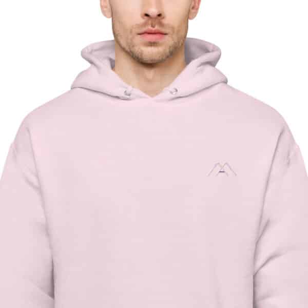 unisex fleece hoodie pale pink zoomed in 61b688a143a9e